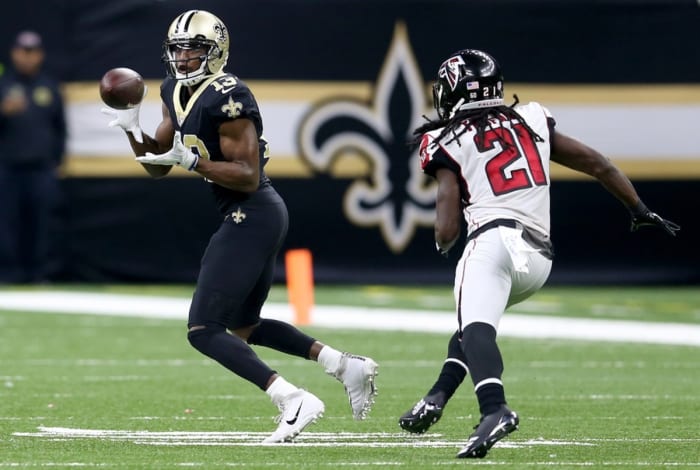 New Orleans Saints receiver Michael Thomas (13) makes a catch over Atlanta Falcons cornerback Desmond Trufant (21). Mandatory Credit: Chuck Cook-USA TODAY